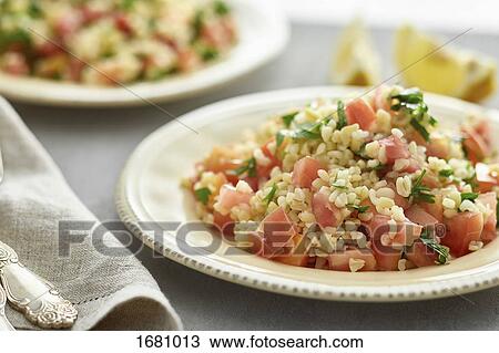 Close-up of food in plate on table View Large Photo Image Stock Image - Close-up of food in plate on table. Fotosearch