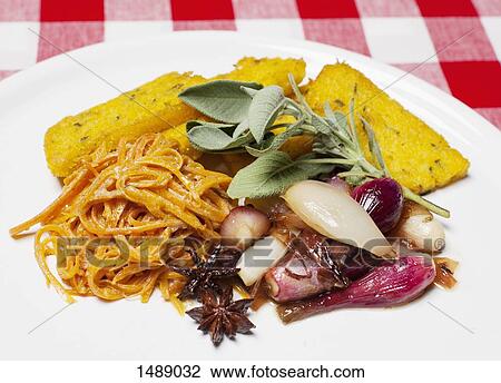 Close-up of food served in plate on table View Large Photo Image Stock Image - Close-up of food served in plate on table. Fotosearch