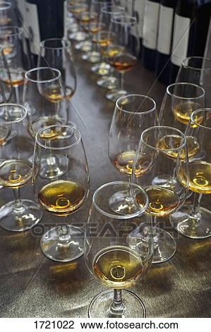 Close-up of glasses with Madeira wine on bar counter View Large Photo Image Stock Image - Close-up of glasses with Madeira wine on bar counter. Fotosearch