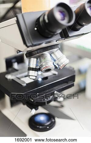 Stock Image - Close-up of microscope in laboratory. Fotosearch
