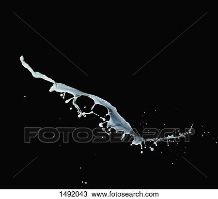 Close-up of milk splashing against black background View Large Photo Image Stock Image - Close-up of milk splashing against black background. Fotosearch