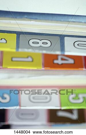 Picture - Close-up of numbers on medical folders at hospital. Fotosearch