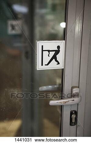 Close-up of pull sign on door View Large Photo Image Stock Image - Close-up of pull sign on door. Fotosearch