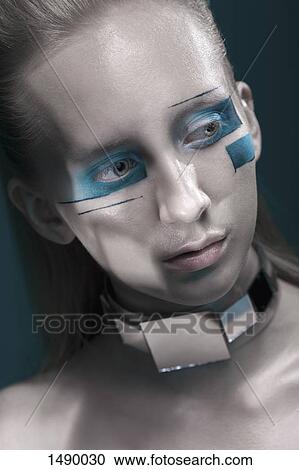 Close-up of thoughtful fashion model looking away View Large Photo Image Stock Image - Close-up of thoughtful fashion model looking away. Fotosearch