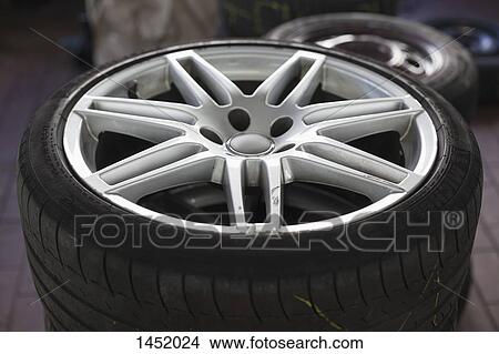 Picture - Close-up of tire at garage. Fotosearch