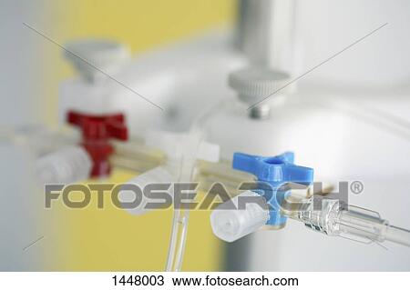 Stock Image - Close-up of valve on medical equipment. Fotosearch