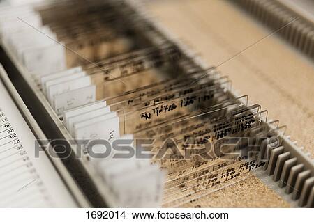 Picture - Close-up of various microscope slides in container at laboratory. Fotosearch