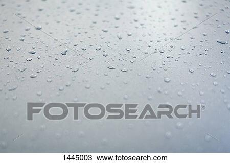 Close-up of water drops on a gray surface View Large Photo Image Stock Image - Close-up of water drops on a gray surface. Fotosearch