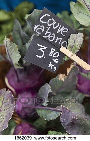 Close up Portuguese cabbage kale with price sign View Large Photo Image Stock Photo - Close up Portuguese cabbage kale with price sign. Fotosearch