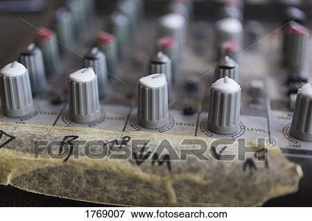 Close up sound mixer dials with taped markings View Large Photo Image Stock Photo - Close up sound mixer dials with taped markings. Fotosearch