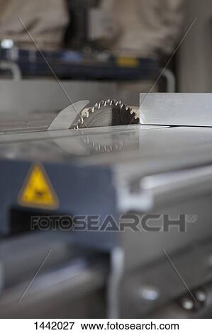 Close-up, surface level perspective of sliding table saw in workshop View Large Photo Image Stock Photo - Close-up, surface level perspective of sliding table saw in workshop. Fotosearch