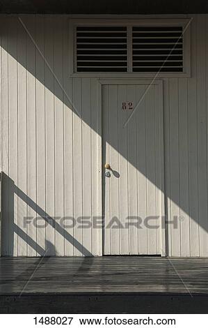 Stock Photo - Closed door of beach hut. Fotosearch