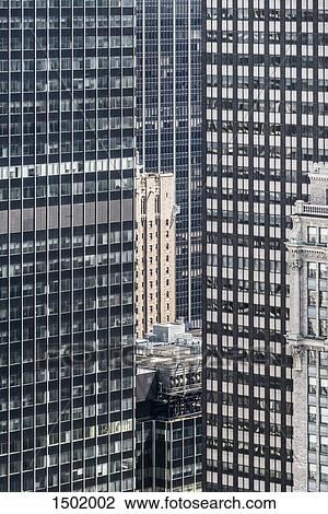 Conceptual, close-up, full frame view of modern office buildings, Manhattan, NYC View Large Photo Image Stock Image - Conceptual, close-up, full frame view of modern office buildings, Manhattan, NYC. Fotosearch