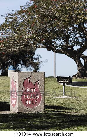 Container for HOT COALS ONLY in park during sunny day View Large Photo Image Picture - Container for HOT COALS ONLY in park during sunny day. Fotosearch