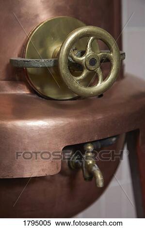 Stock Photography - Copper still in distillery. Fotosearch
