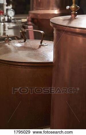 Copper stills in distillery View Large Photo Image Stock Photo - Copper stills in distillery. Fotosearch