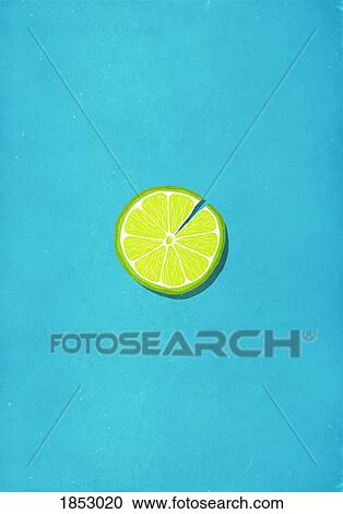 Stock Image - Cracked lime slice against blue background. Fotosearch