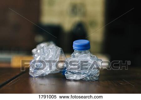 Crumpled, recycled plastic water bottles View Large Photo Image Stock Photography - Crumpled, recycled plastic water bottles. Fotosearch