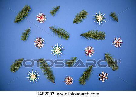 Directly above shot of Christmas decorations on blue background View Large Photo Image Stock Photo - Directly above shot of Christmas decorations on blue background. Fotosearch