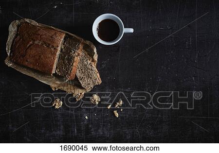 Directly above shot of walnut cake with coffee mug on granite View Large Photo Image Stock Photography - Directly above shot of walnut cake with coffee mug on granite. Fotosearch