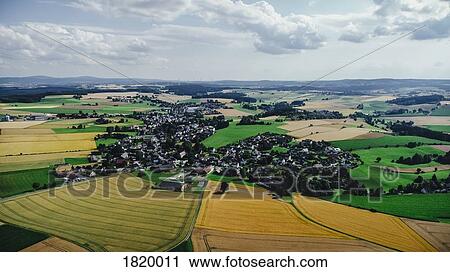 Drone point of view sunny view farmland and rural townscape, Bayern, Germany View Large Photo Image Stock Image - Drone point of view sunny view farmland and rural townscape, Bayern, Germany. Fotosearch
