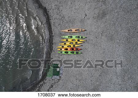 Drone view of colorful canoes at beach, Anchorage, Alaska, USA View Large Photo Image Stock Photo - Drone view of colorful canoes at beach, Anchorage, Alaska, USA. Fotosearch