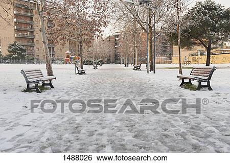 Empty benches in snow covered field at park, Rome, Lazio, Italy View Large Photo Image Stock Photograph - Empty benches in snow covered field at park, Rome, Lazio, Italy. Fotosearch