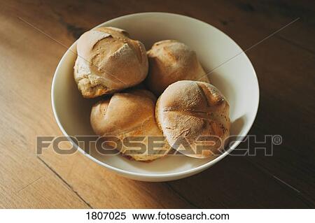 Fresh baked wheat rolls in bowl View Large Photo Image Stock Photography - Fresh baked wheat rolls in bowl. Fotosearch