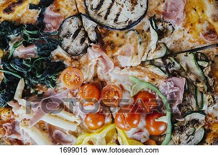 Full frame shot of fresh pizza View Large Photo Image Stock Photography - Full frame shot of fresh pizza. Fotosearch