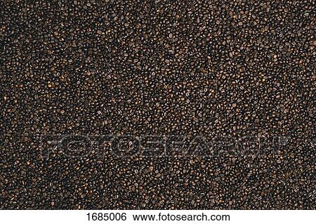 Stock Photograph - Full frame shot of roasted coffee beans. Fotosearch
