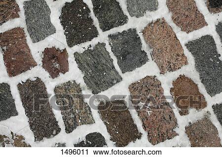 Full frame shot of snow on cobblestone street View Large Photo Image Stock Image - Full frame shot of snow on cobblestone street. Fotosearch