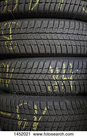 Stock Image - Full frame shot of stacked tires. Fotosearch