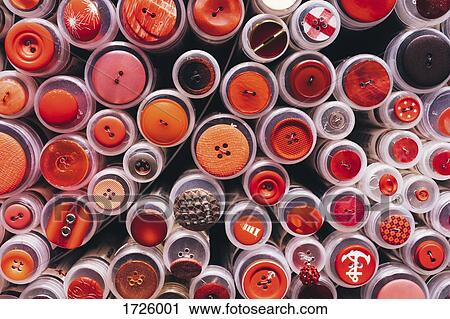 Stock Image - Full frame shot of various buttons on plastic containers. Fotosearch