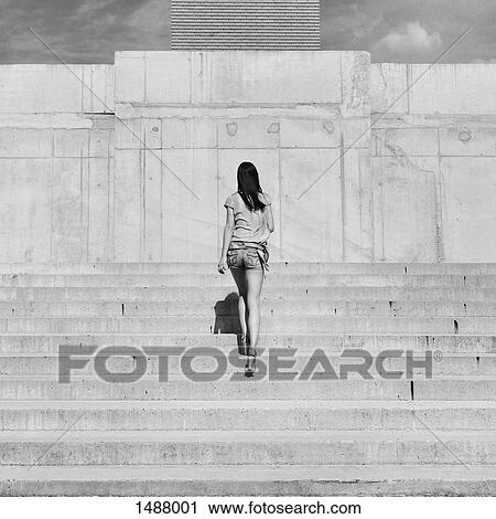 Full length rear view of woman walking upstairs, Budapest, Hungary View Large Photo Image Stock Image - Full length rear view of woman walking upstairs, Budapest, Hungary. Fotosearch
