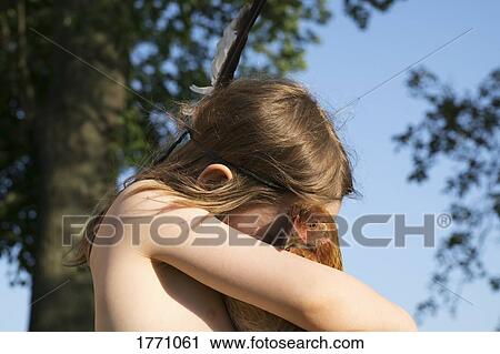 Girl hugging chicken View Large Photo Image Stock Image - Girl hugging chicken. Fotosearch