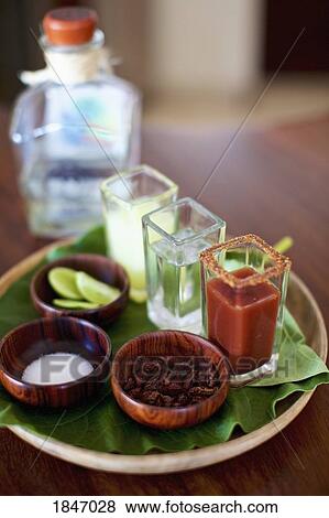 Gourmet tequila shots on tray View Large Photo Image Stock Photo - Gourmet tequila shots on tray. Fotosearch