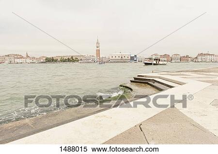 Grand Canal and view of city beyond against sky, Venice, Veneto, Italy View Large Photo Image Stock Photography - Grand Canal and view of city beyond against sky, Venice, Veneto, Italy. Fotosearch