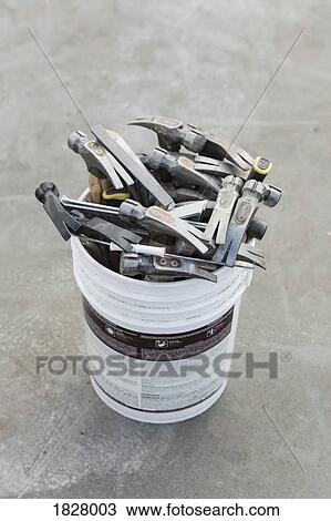 Hammers in bucket View Large Photo Image Stock Image - Hammers in bucket. Fotosearch