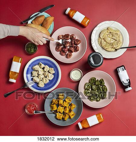 Hand reaching for dumplings View Large Photo Image Stock Image - Hand reaching for dumplings. Fotosearch