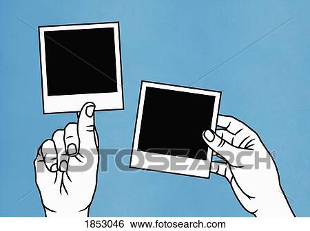 Hands holding instant photographs View Large Photo Image Stock Photograph - Hands holding instant photographs. Fotosearch