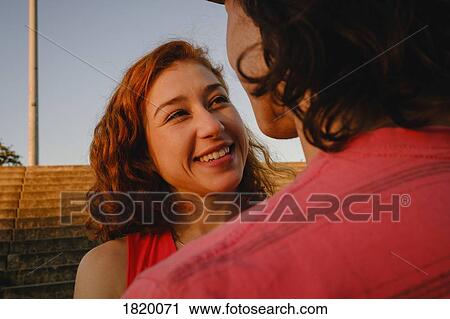 Happy woman looking at boyfriend View Large Photo Image Stock Image - Happy woman looking at boyfriend. Fotosearch