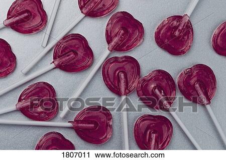 Heart-shape lollipops View Large Photo Image Stock Image - Heart-shape lollipops. Fotosearch