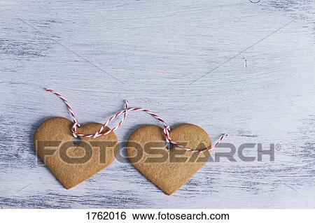 Heart shaped gingerbread Christmas cookie decorations View Large Photo Image Stock Photograph - Heart shaped gingerbread Christmas cookie decorations. Fotosearch