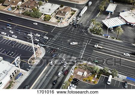High angle view of cars moving on intersecting roads in city, Las Vegas, Nevada, USA View Large Photo Image Stock Photograph - High angle view of cars moving on intersecting roads in city, Las Vegas, Nevada, USA. Fotosearch