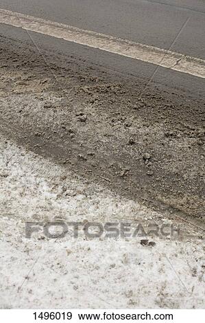 High angle view of dirt by road View Large Photo Image Stock Photo - High angle view of dirt by road. Fotosearch