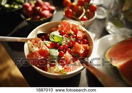 High angle view of fruit salad in bowl on table View Large Photo Image Stock Image - High angle view of fruit salad in bowl on table. Fotosearch
