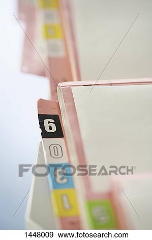 High angle view of medical folders at hospital View Large Photo Image Stock Photo - High angle view of medical folders at hospital. Fotosearch