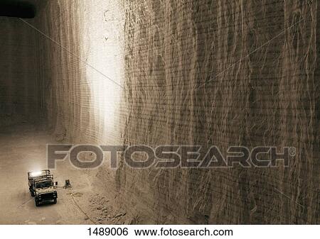 Stock Photograph - High angle view of pick-up truck at underground salt mine. Fotosearch