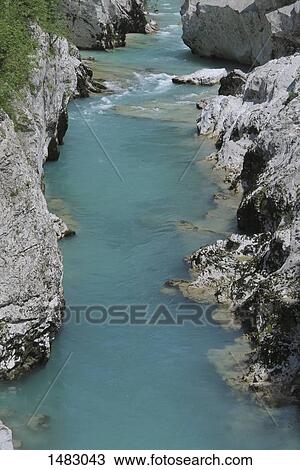 Stock Image - High angle view of river amidst rocks. Fotosearch