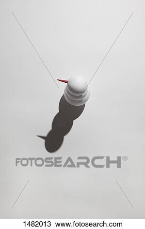 High angle view of snowman and its shadow over white background View Large Photo Image Stock Image - High angle view of snowman and its shadow over white background. Fotosearch